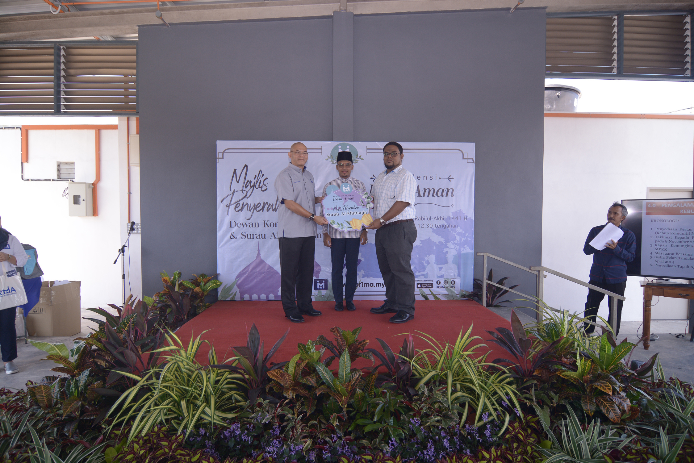 Cover image of Community Past Program: OFFICIAL HANDING OVER CEREMONY OF COMMUNITY HALL AND SURAU AL-MUTAQQIN